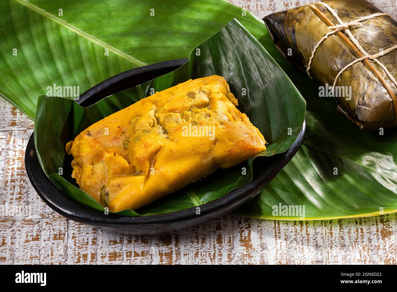 Tamale Typical Colombian Food Wrapped In Banana Leaves Stock Photo Alamy