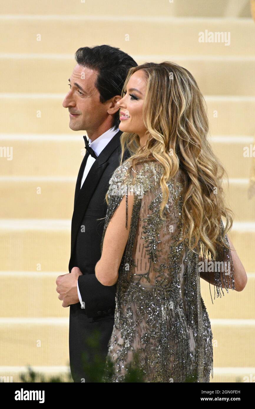 Adrien Brody and Georgina Chapman attend The 2021 Met Gala Celebrating In America: A Lexicon Of Fashion at The Metropolitan Museum of Art on September Stock Photo