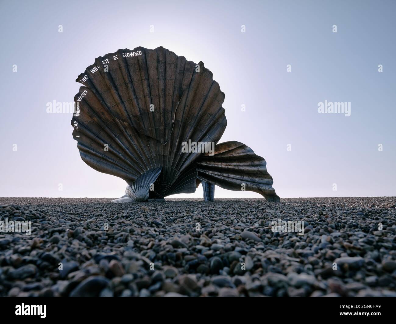 Maggi Hambling The Scallop (2003) Aldeburgh beach. The edge of the main shell is pierced with the words, 'I hear those voices that will not be drowned Stock Photo
