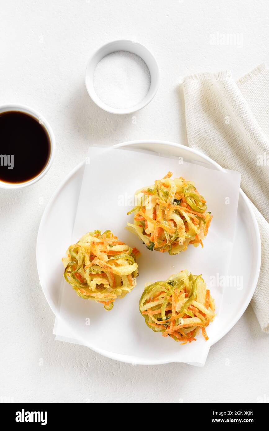 Japanese kakiage tempura. Deep fried vegetable in asian style. White