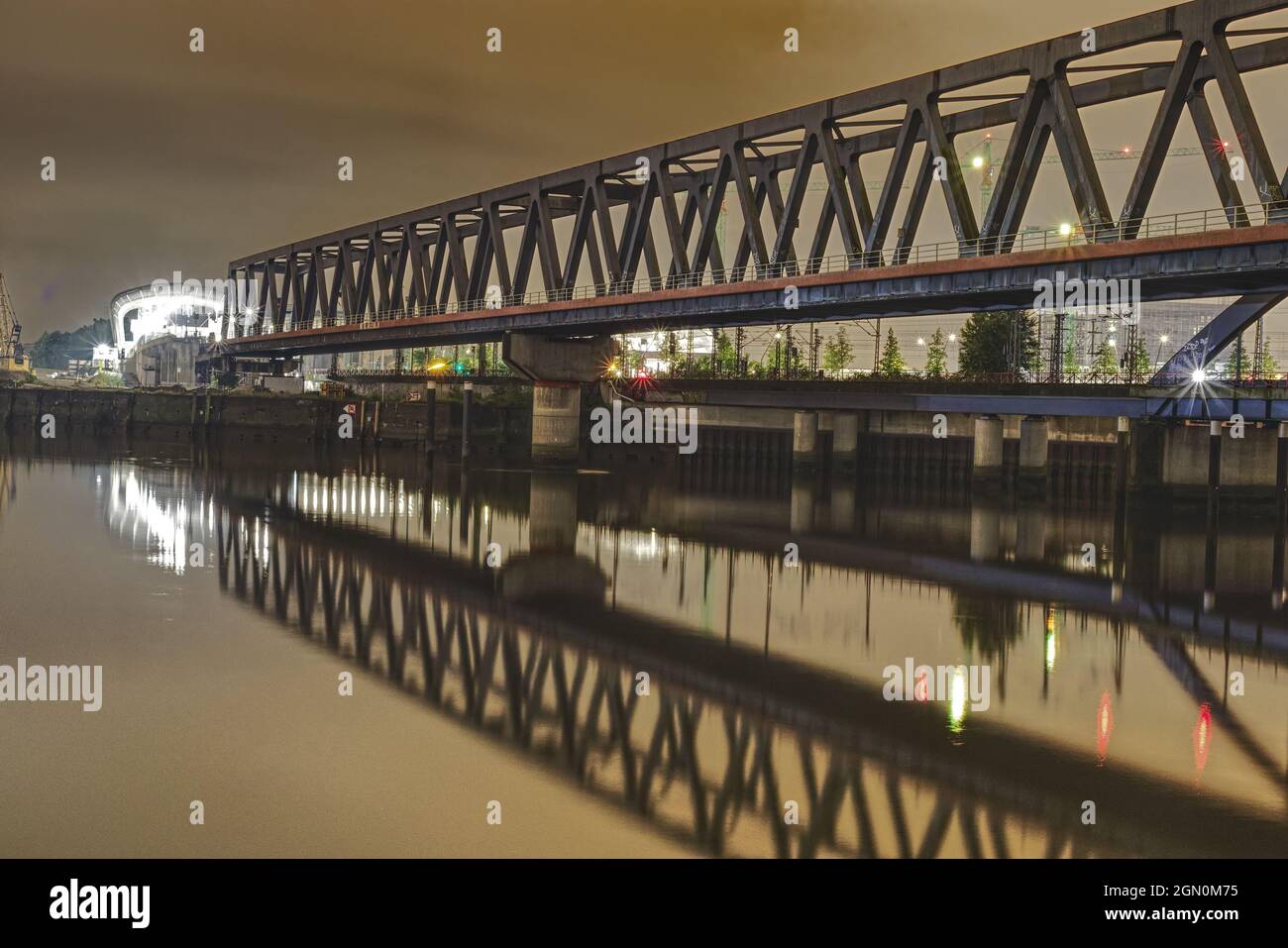 scenic night shot of railway bridge at night Stock Photo