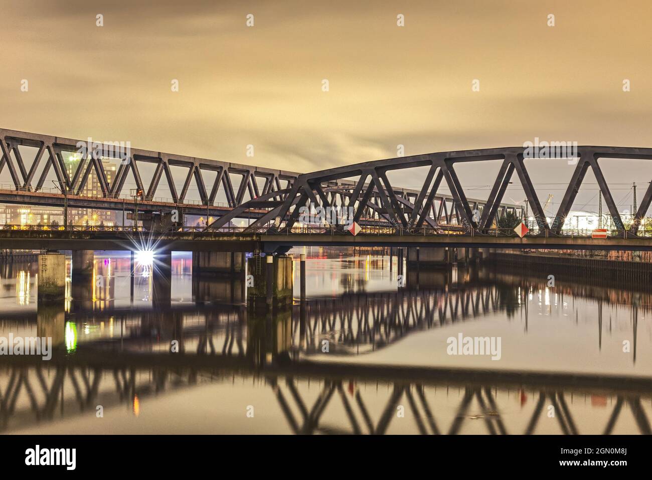 scenic night shot of railway bridge at night Stock Photo