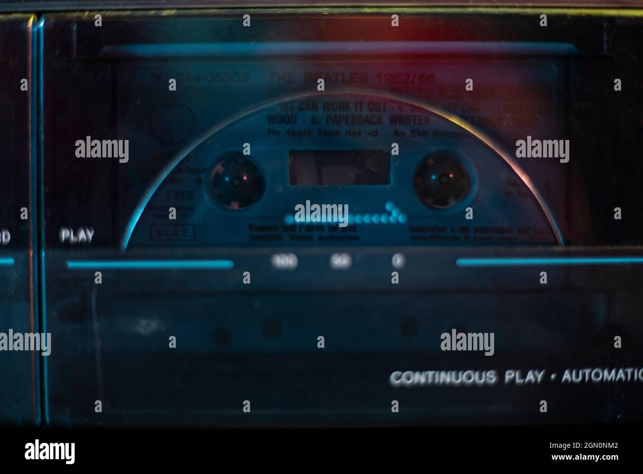 Music cassette play detail in a cassette player Stock Photo Alamy