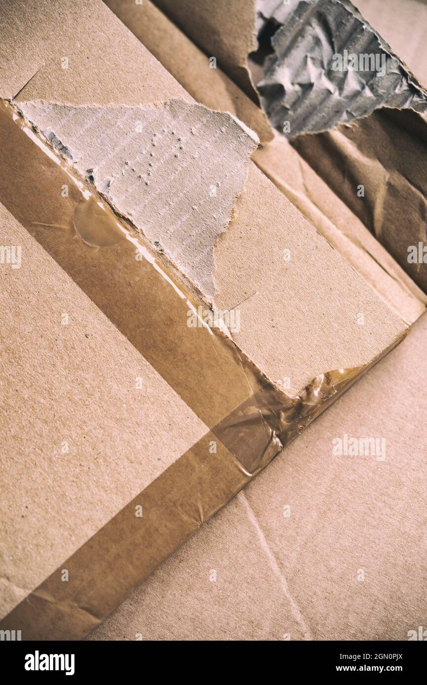 Ripped and damaged pieces of a cardboard box Stock Photo Alamy