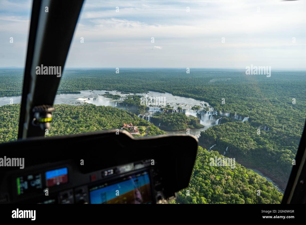 Aerial view of the waterfalls at Iguazu Falls seen through the window ...