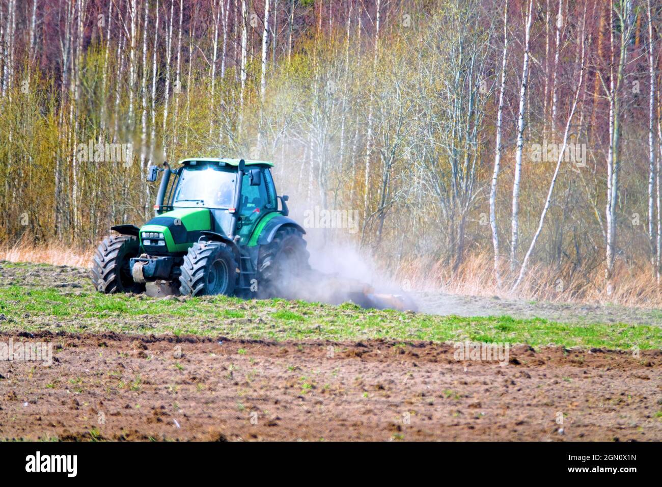 Spring disk plowing of the fallow, cultivation with a disk harrow Stock ...