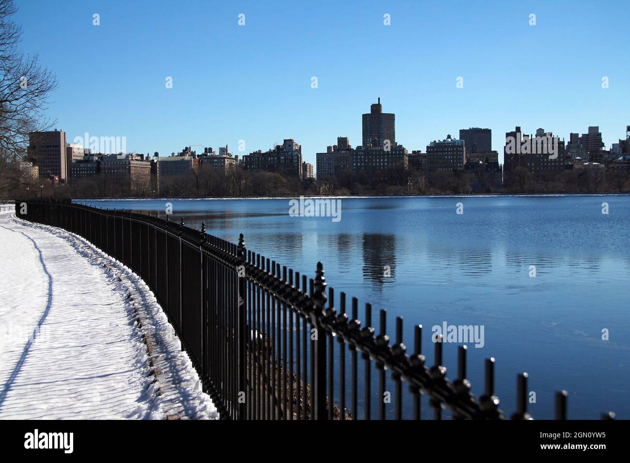 Upper East Side of New York City behind the iconic reservoir in Central Park Stock Photo