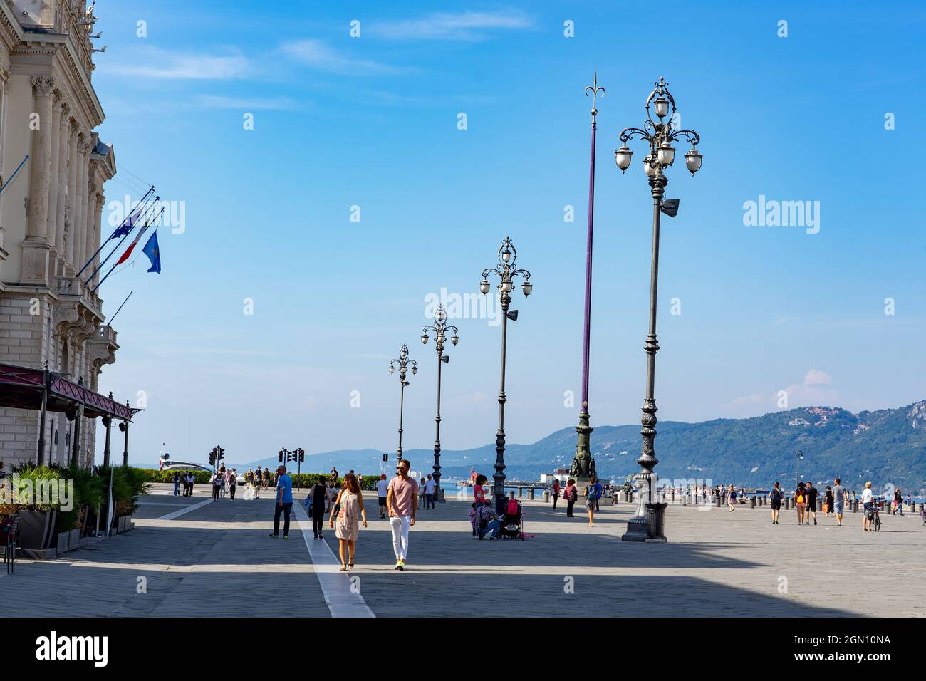 11.08.2021: Trieste, Italy: Plaza Unidad de Italia with people walking around Stock Photo