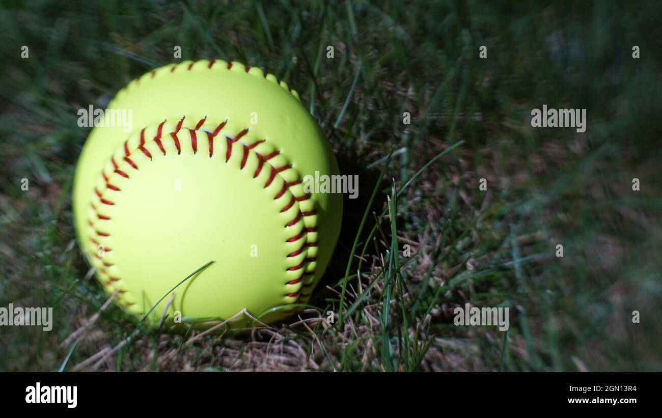 Yellow ball on the softball field hi-res stock photography and images ...