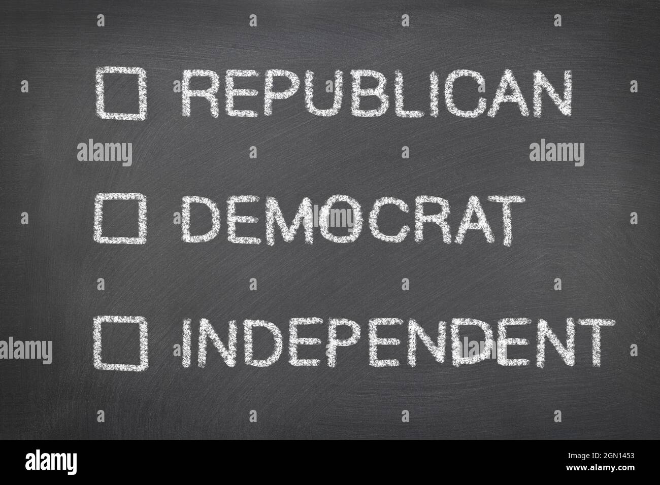 A blackboard with chalk written political party choices, including republican, democrats and independents. Includes check boxes left empty for designe Stock Photo