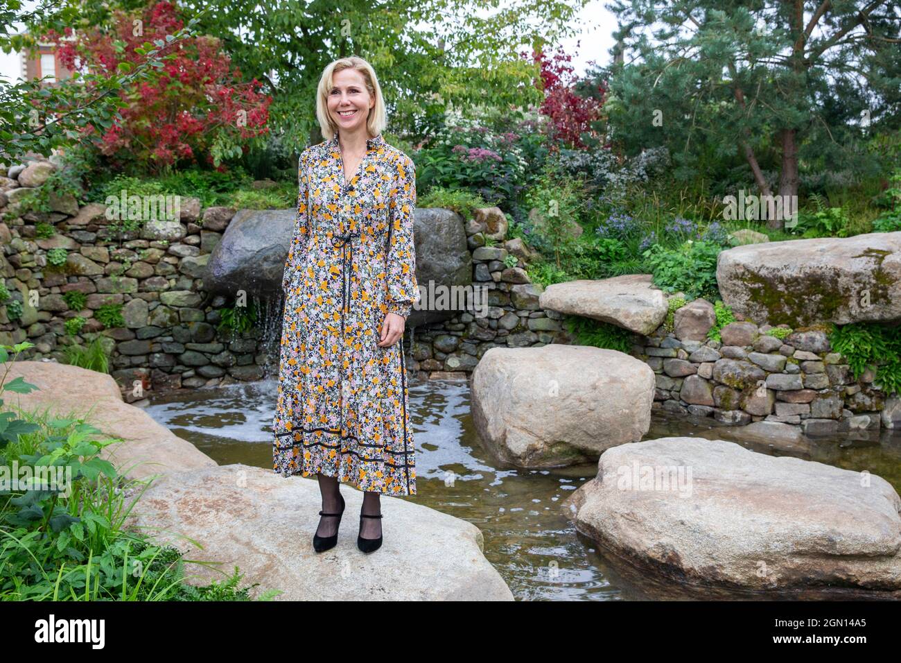 Actress, television presenter and comedian, Sally Phillips, poses at the RHS Chelsea Flower Show. Stock Photo