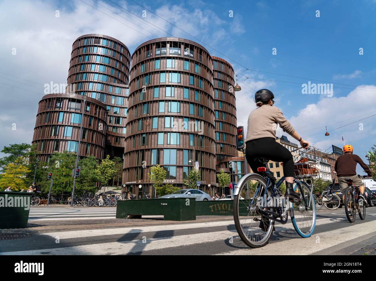 Cyclists on cycle paths in the city centre of Copenhagen, considered the cycling capital of the world, 45 % of the inhabitants travel by bike, modern Stock Photo