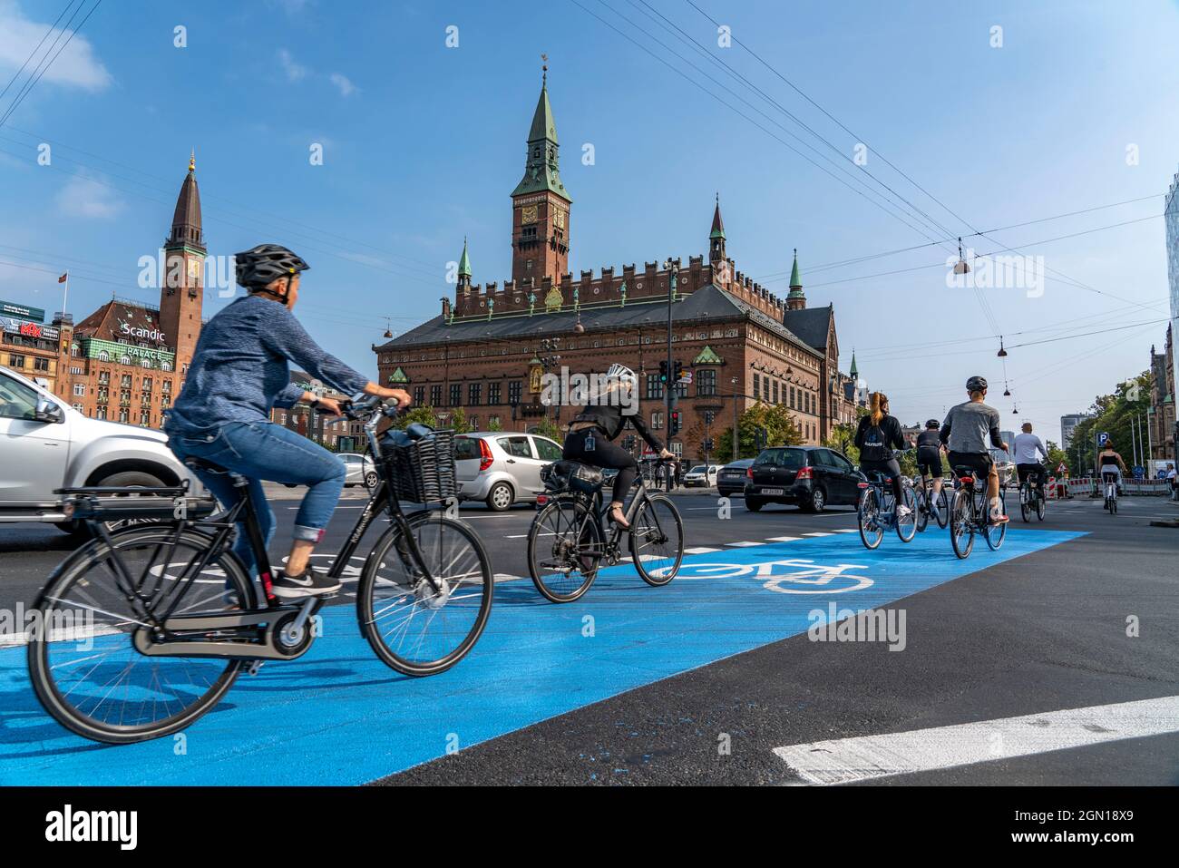 Cyclists on cycle paths, Radhuspladsen, City Hall Square, in downtown Copenhagen, is considered the cycling capital of the world, 45% of residents tra Stock Photo