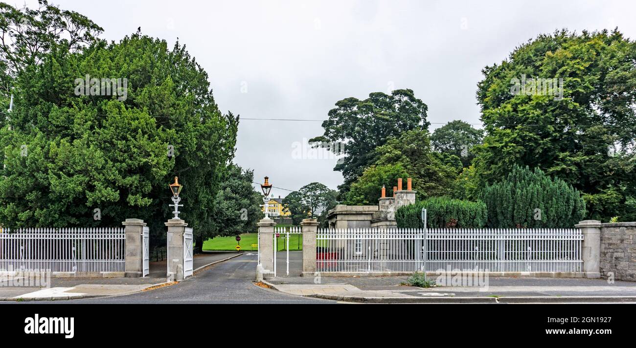 The newly rehung and reinstalled railings and gates at the Chapelizod entry to the Phoenix Park in Dublin, Ireland. Stock Photo