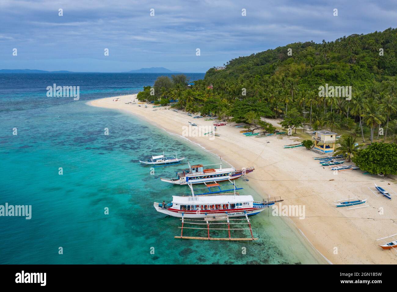 Aerial view of traditional Filipino Banca outrigger canoes on Nagosa Beach, Cobrador Island, Romblon, Romblon, Philippines, Asia Stock Photo