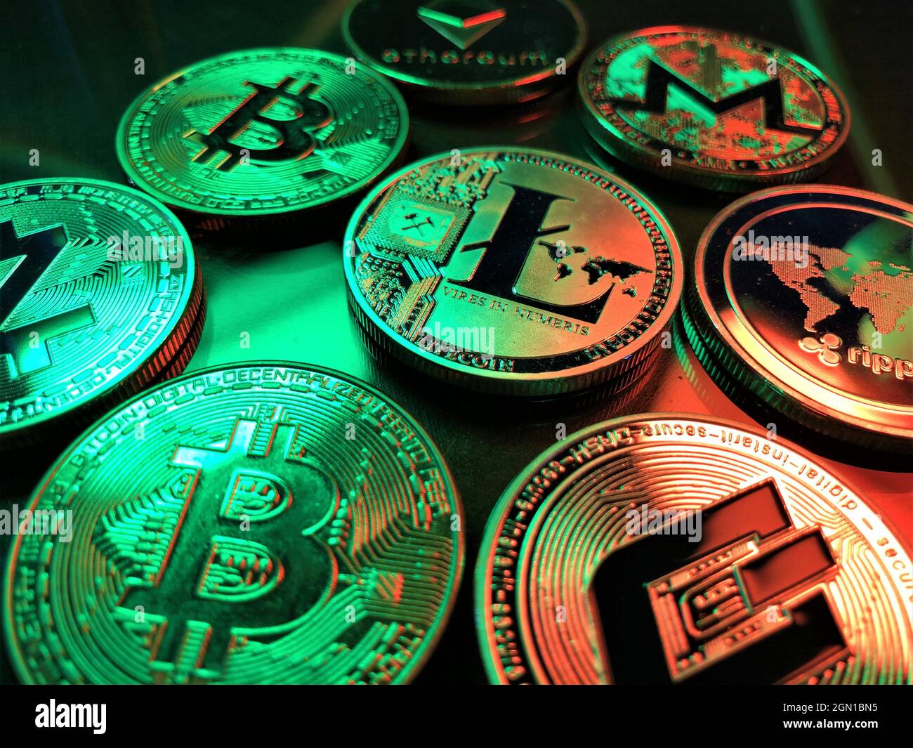 A pile of cryptocurrency coins. A digital asset designed to work as a  medium of exchange that uses strong cryptography to secure financial  transaction Stock Photo - Alamy