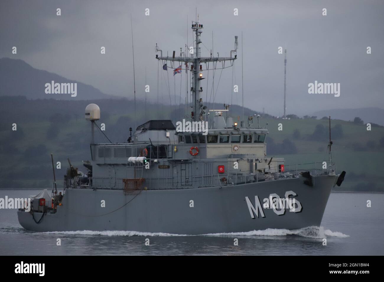 LVNS Talivaldis (M-06), an Alkmaar-class (Tripartite) minehunter operated by the Latvian Navy, passing Greenock on the Firth of Clyde, prior to participating in the military exercises Dynamic Mariner 2021 and Joint Warrior 21-2. This vessel once served in the Royal Netherlands Navy before being decommissioned and sold to Latvia. Stock Photo