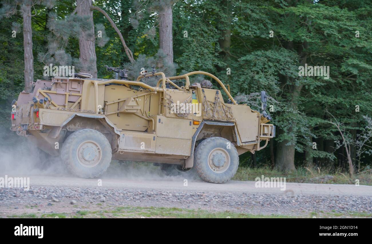 British army Supacat Jackal 4x4 rapid assault, fire support and reconnaissance vehicles on exercise, Salisbury Plain (SPTA) UK Stock Photo