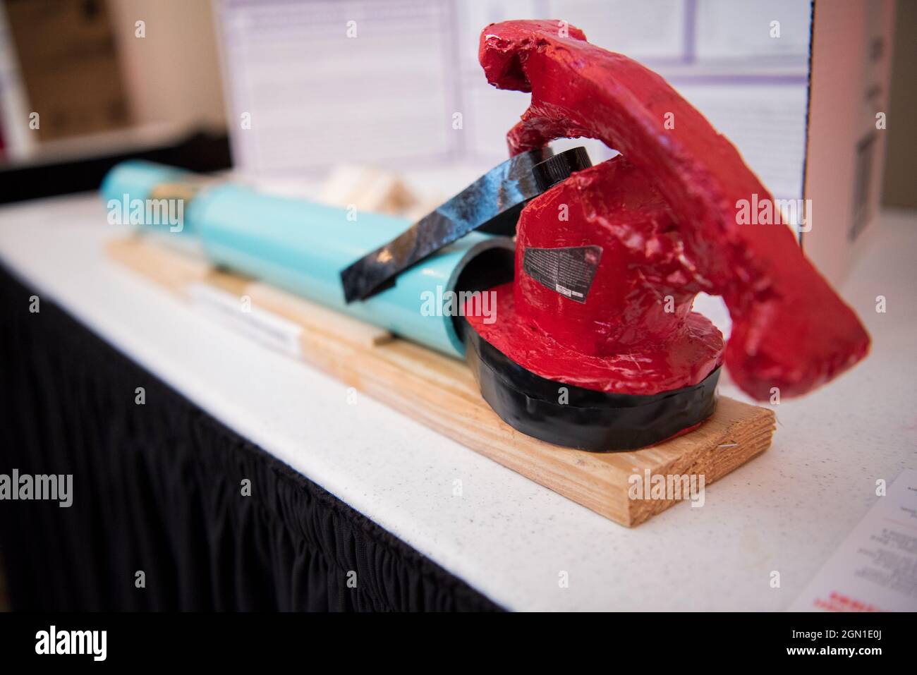 Red tape and blue tube science project exhibiton Stock Photo