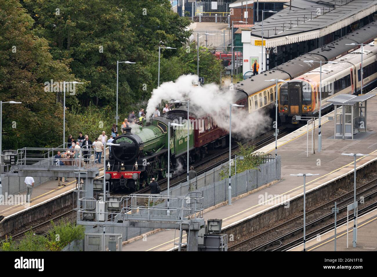 The Mayflower 61306 B1 steam locomotive painted in the early British Railways apple green livery, with passengers at Basingstoke train station, UK Stock Photo