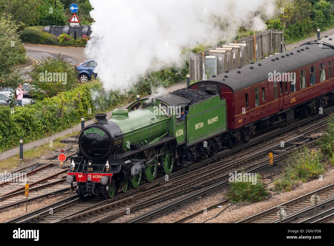 The Mayflower 61306 B1 steam locomotive painted in the early British Railways apple green livery, pulling out of Basingstoke train station, UK Stock Photo