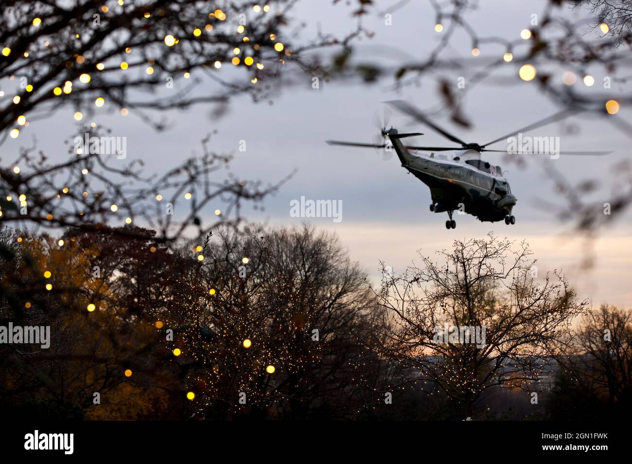 Marine One departs the South Lawn of the White House, Nov. 26, 2011. (Official White House Photo by Pete Souza) This official White House photograph is being made available only for publication by news organizations and/or for personal use printing by the subject(s) of the photograph. The photograph may not be manipulated in any way and may not be used in commercial or political materials, advertisements, emails, products, promotions that in any way suggests approval or endorsement of the President, the First Family, or the White House. Stock Photo