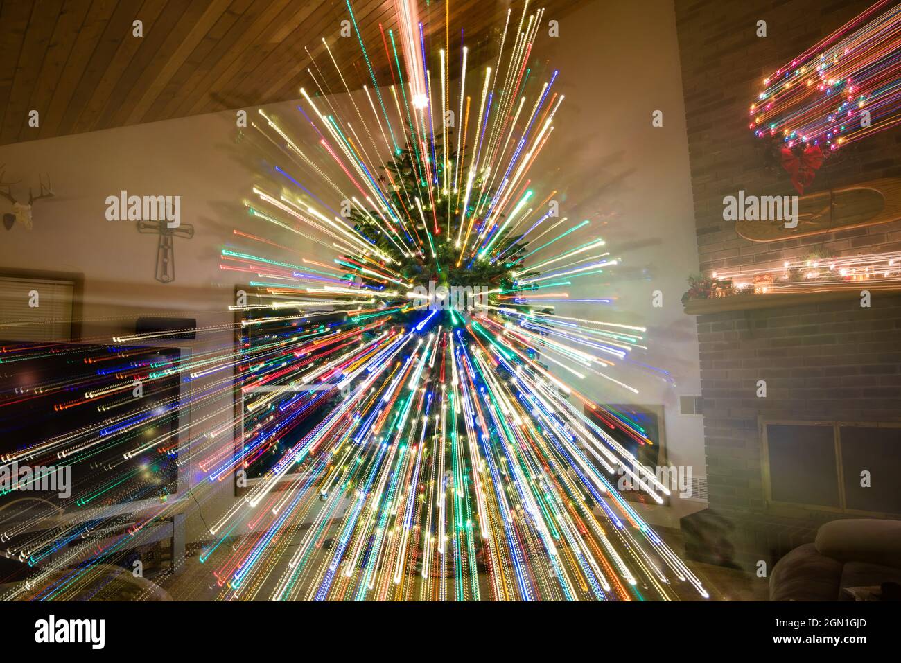 Christmas tree light painting timed exposure. Stock Photo