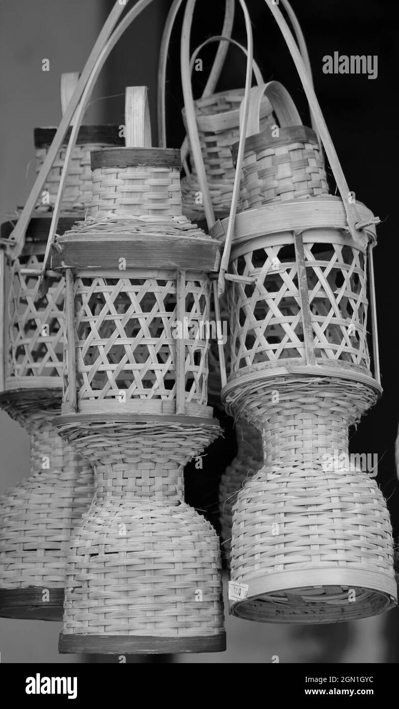 Vertical grayscale shot of wooden sculpture and crafts of Chhattisgarh