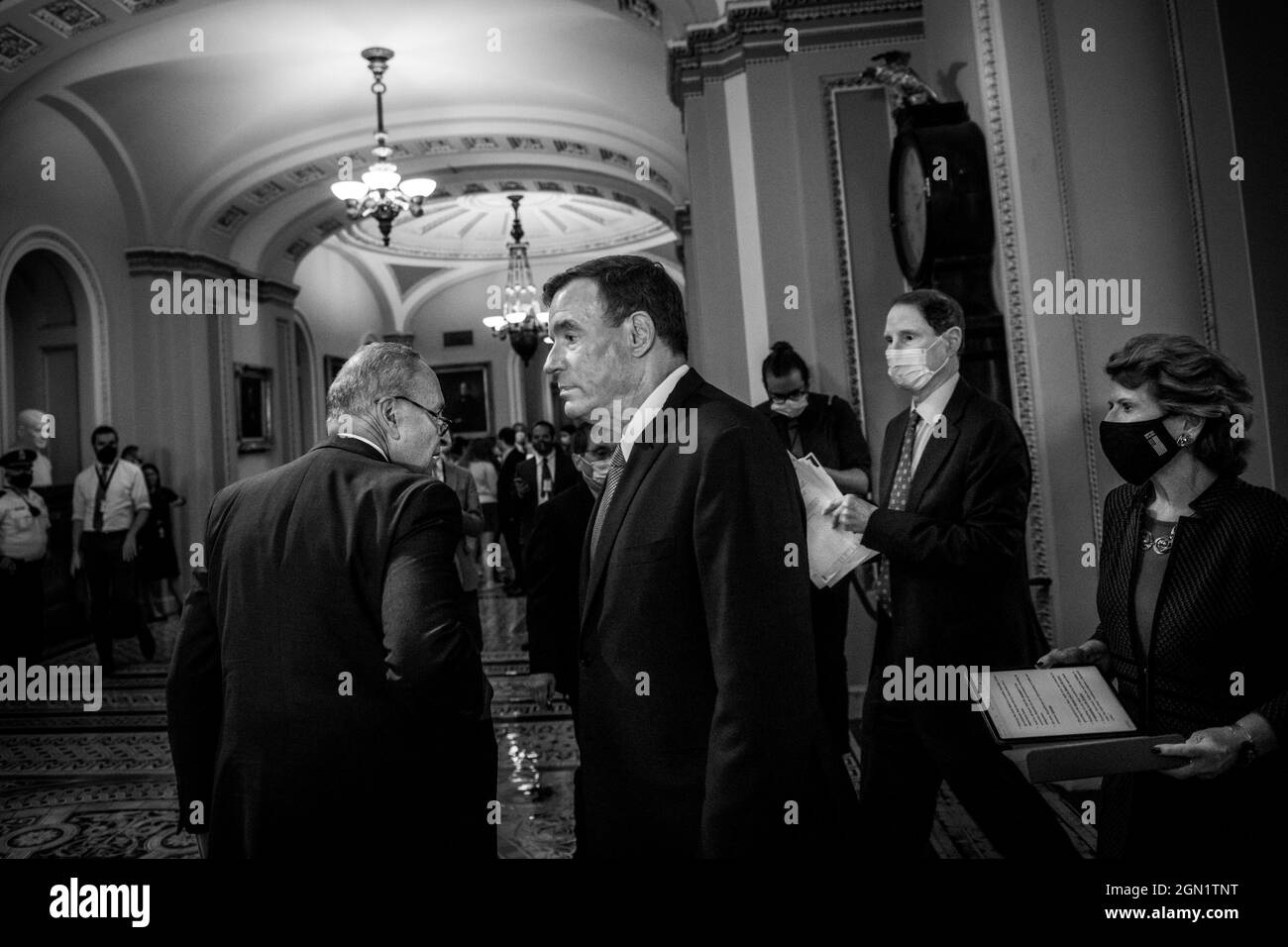 Washington, United States Of America. 21st Sep, 2021. United States Senate Majority Leader Chuck Schumer (Democrat of New York), left, United States Senator Mark Warner (Democrat of Virginia), second from left, United States Senator Ron Wyden (Democrat of Oregon), second from right, and United States Senator Debbie Stabenow (Democrat of Michigan), right, arrive for the Senate Democrat's policy luncheon press conference at the US Capitol in Washington, DC, Tuesday, September 21, 2021. Credit: Rod Lamkey/CNP/Sipa USA Credit: Sipa USA/Alamy Live News Stock Photo