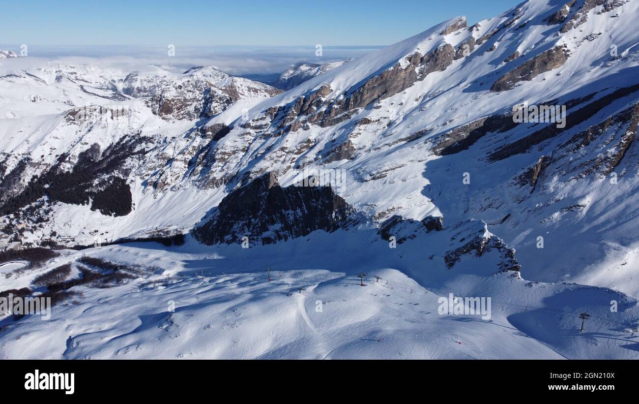 Aerial view of a snowy mountain Stock Photo - Alamy