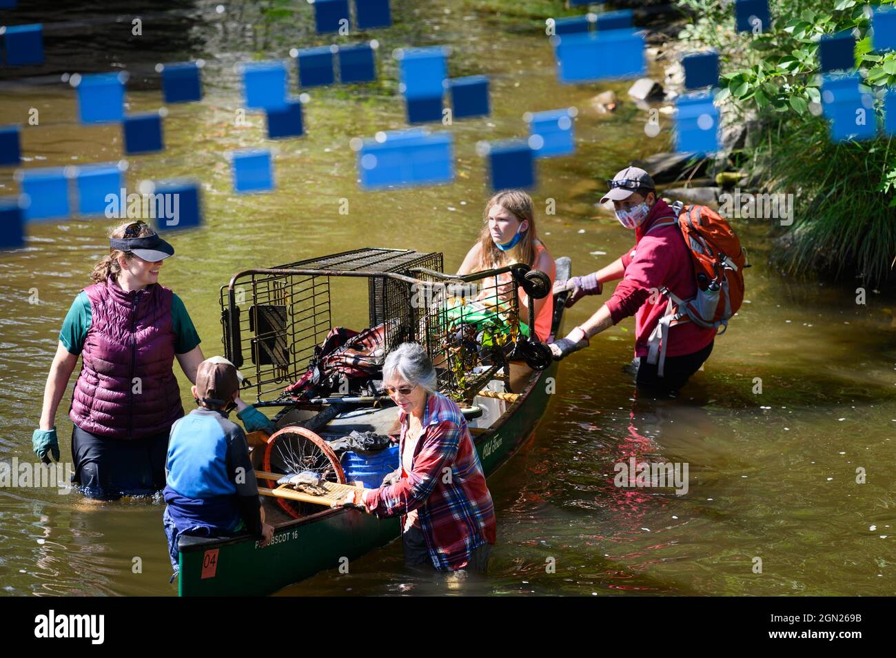 Volunteers from The Friends of the Winooski clean up a section of the