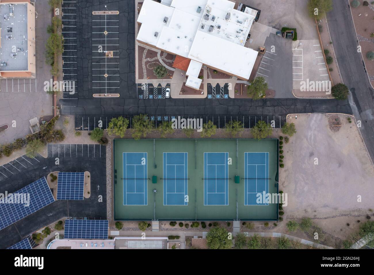Aerial view of tennis courts straight down drone shot Stock Photo