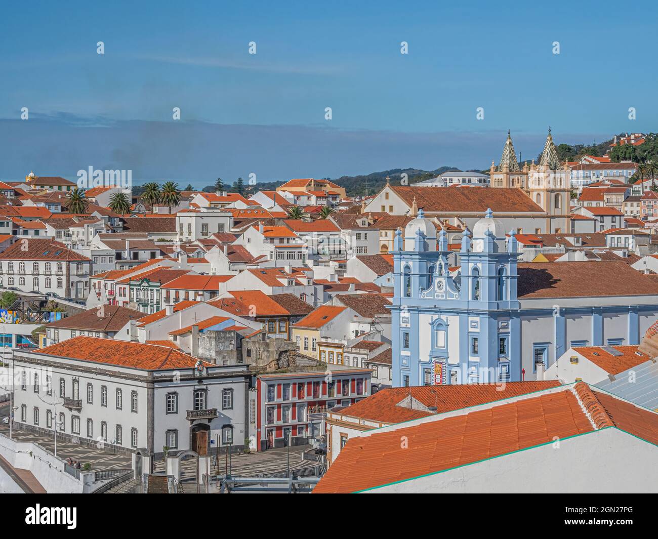 View from above of the blue and white Misericordia Church (the Church of Mercy) and other buildings in the historic city of Angra do Heroismo, Azores, Stock Photo