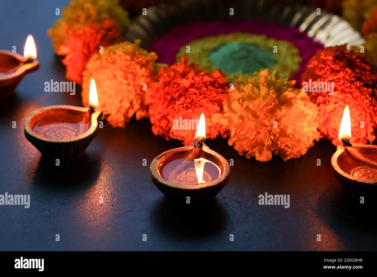 Diwali celebration Indian festival of lights Diya oil lamp and colors ...