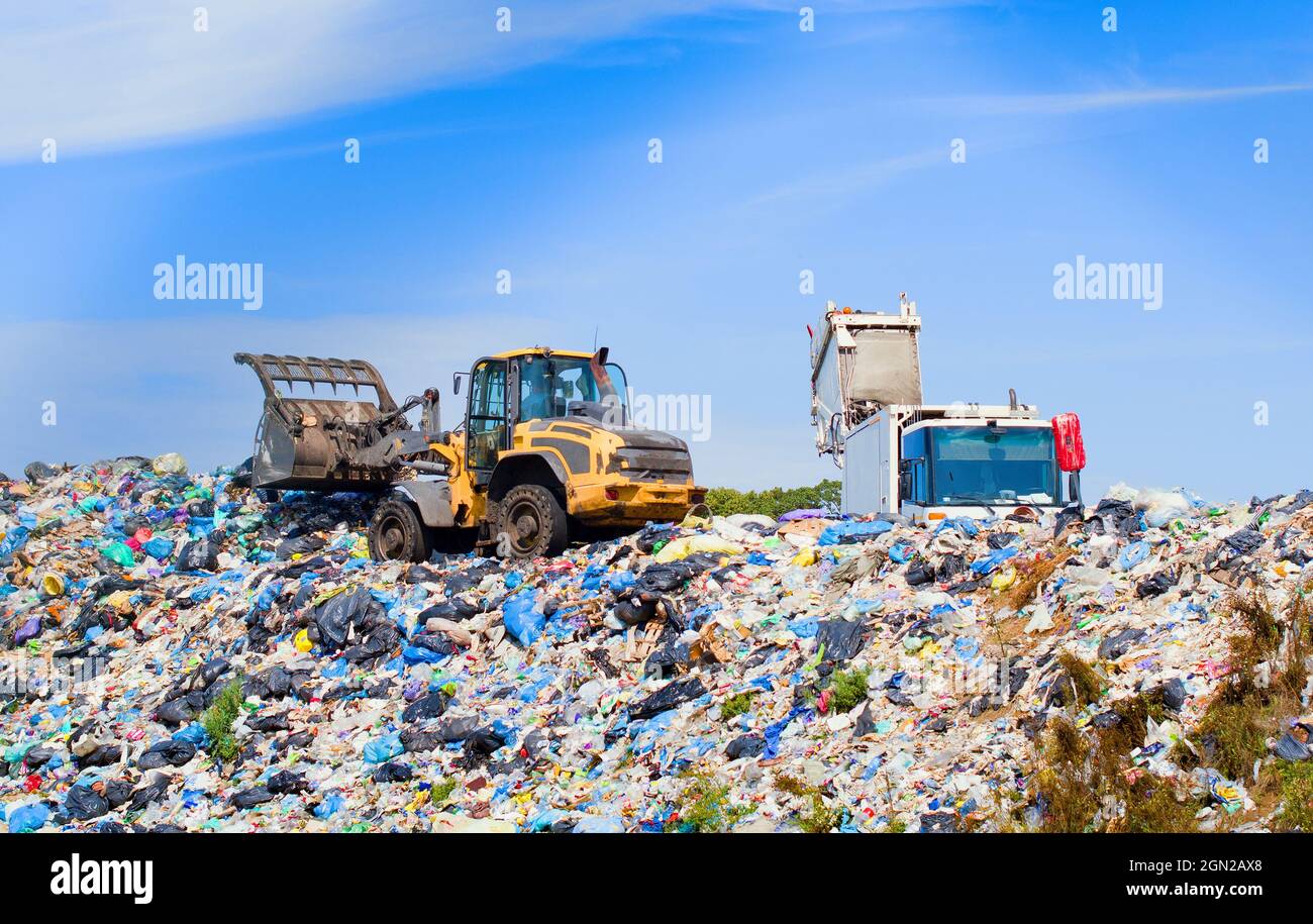 garbage truck unloading at a landfill Stock Photo Alamy