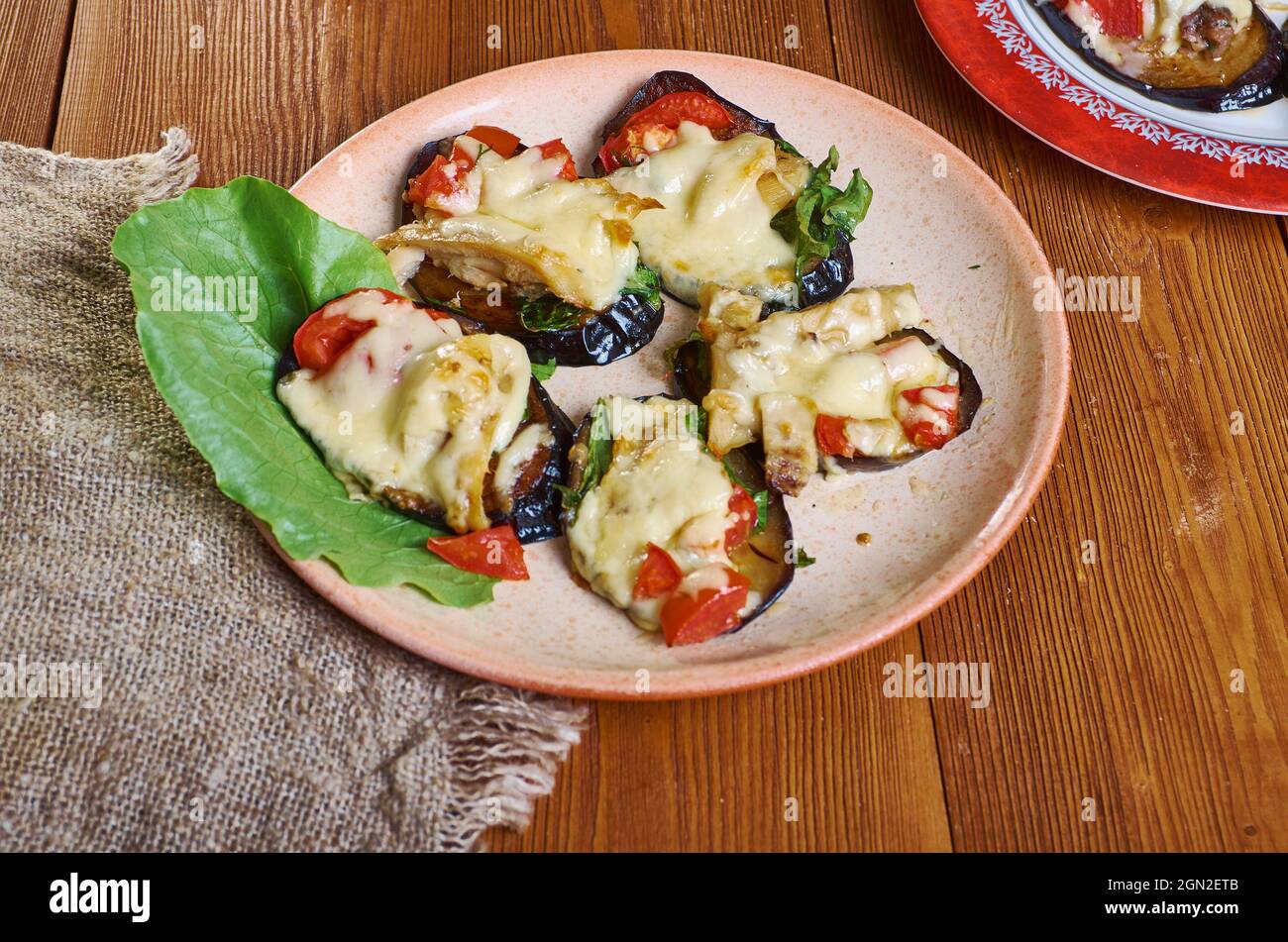 Melanzane al forno Baked eggplant with anchovies and cheese Stock Photo