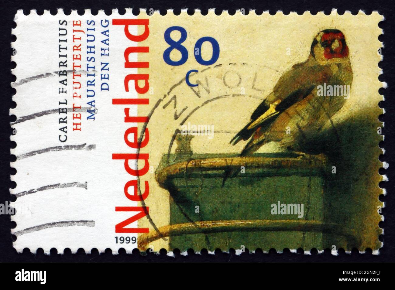 NETHERLANDS - CIRCA 1999: a stamp printed in the Netherlands shows Goldfinch, Painting by Carel Fabritius, circa 1999 Stock Photo