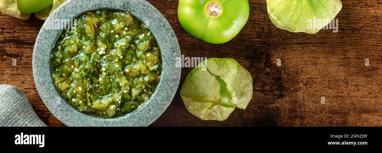 Tomatillos, green tomatoes, and salsa verde, green sauce, panorama with