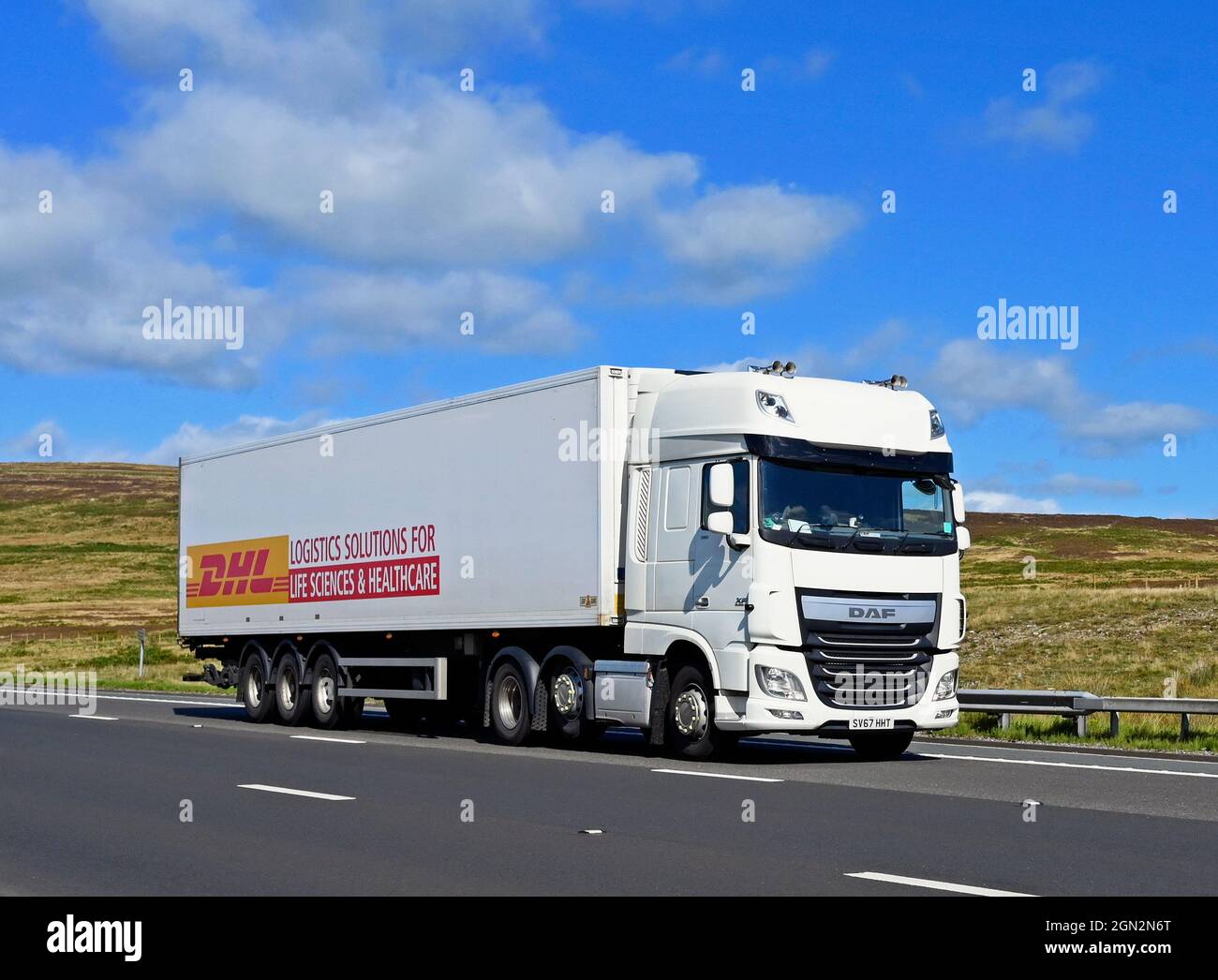 HGV. DHL Logistics Solutions for Life Sciences & Healthcare. M6 Motorway, Southbound. Shap, Cumbria, England, United Kingdom, Europe. Stock Photo