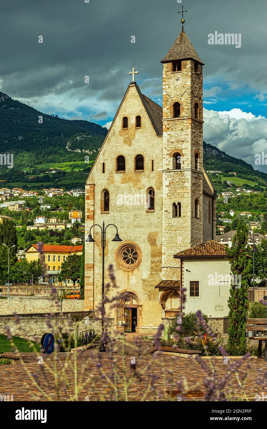 Romanesque church of Sant'Apollinare in Trento, along the Adige river. Trento, autonomous province of Trento, Trentino-Alto Adige, Italy, Europe Stock Photo