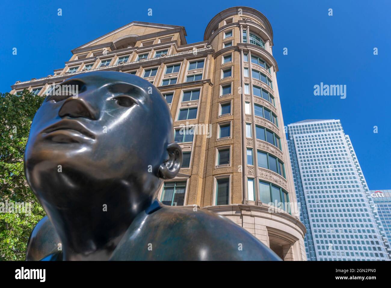 View of Canary Wharf tall buildings and sculpture, Docklands, London ...