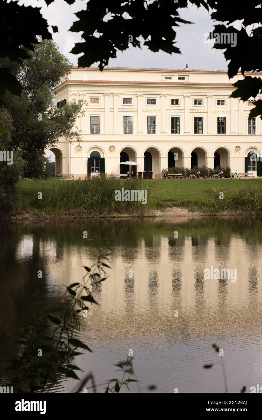 The Pohansko Empire hunting lodge is located in the Lednice-Valtice area. The castle and its reflection in the pond. Stock Photo