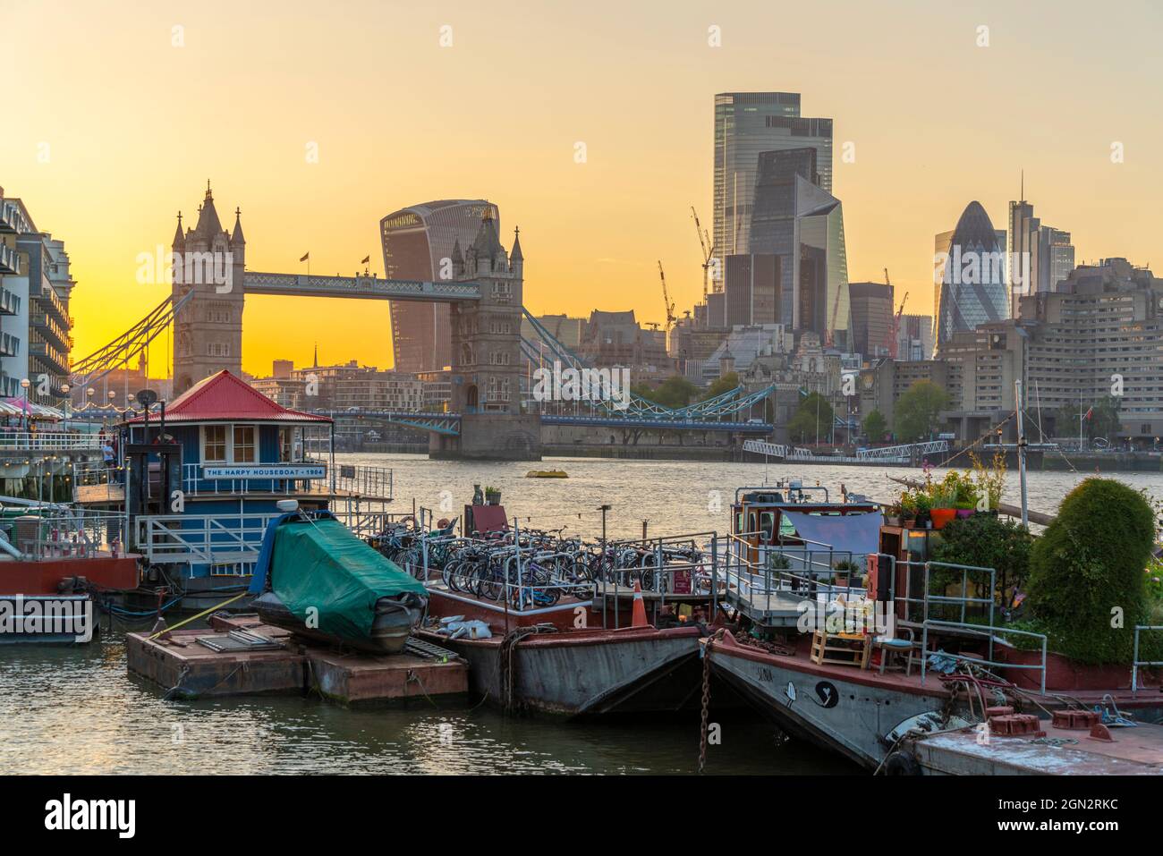 View of Tower Bridge and the City of London in the background at sunset ...