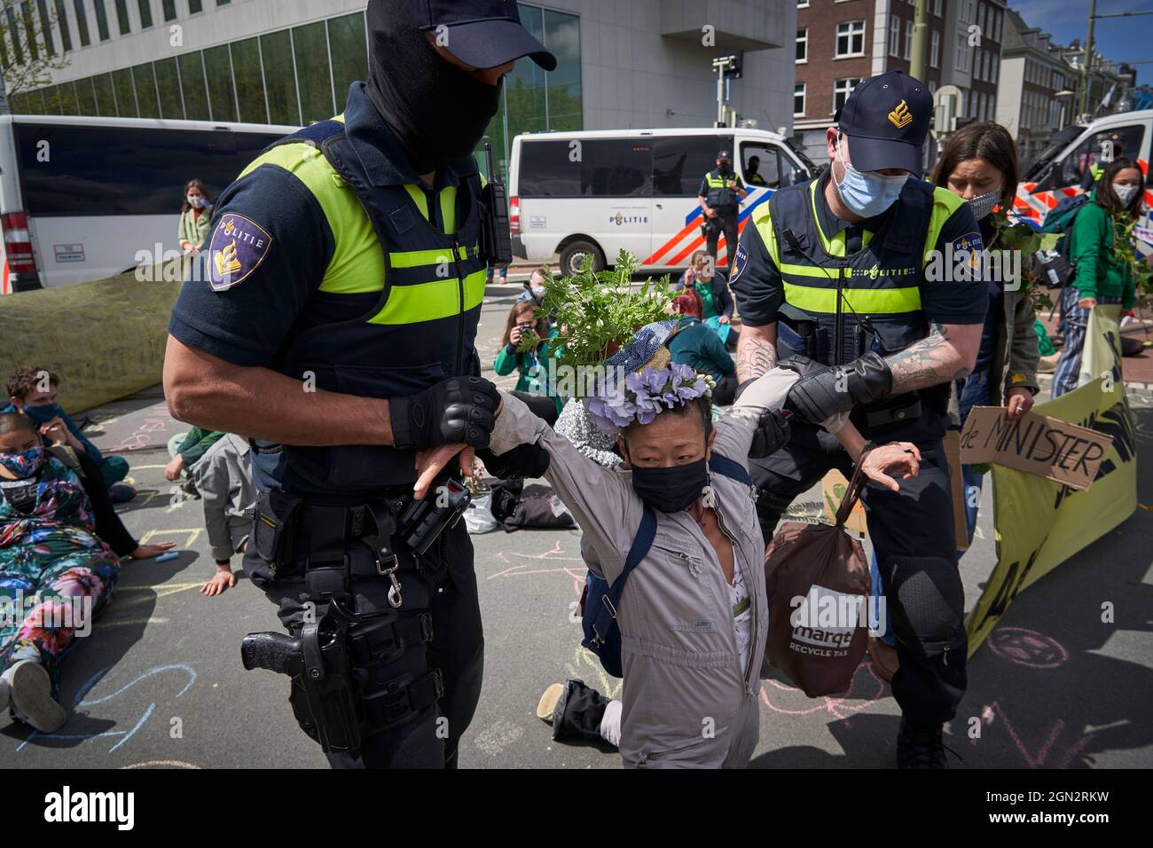 NGO activist, participant in climate change protest, arrested by police Stock Photo