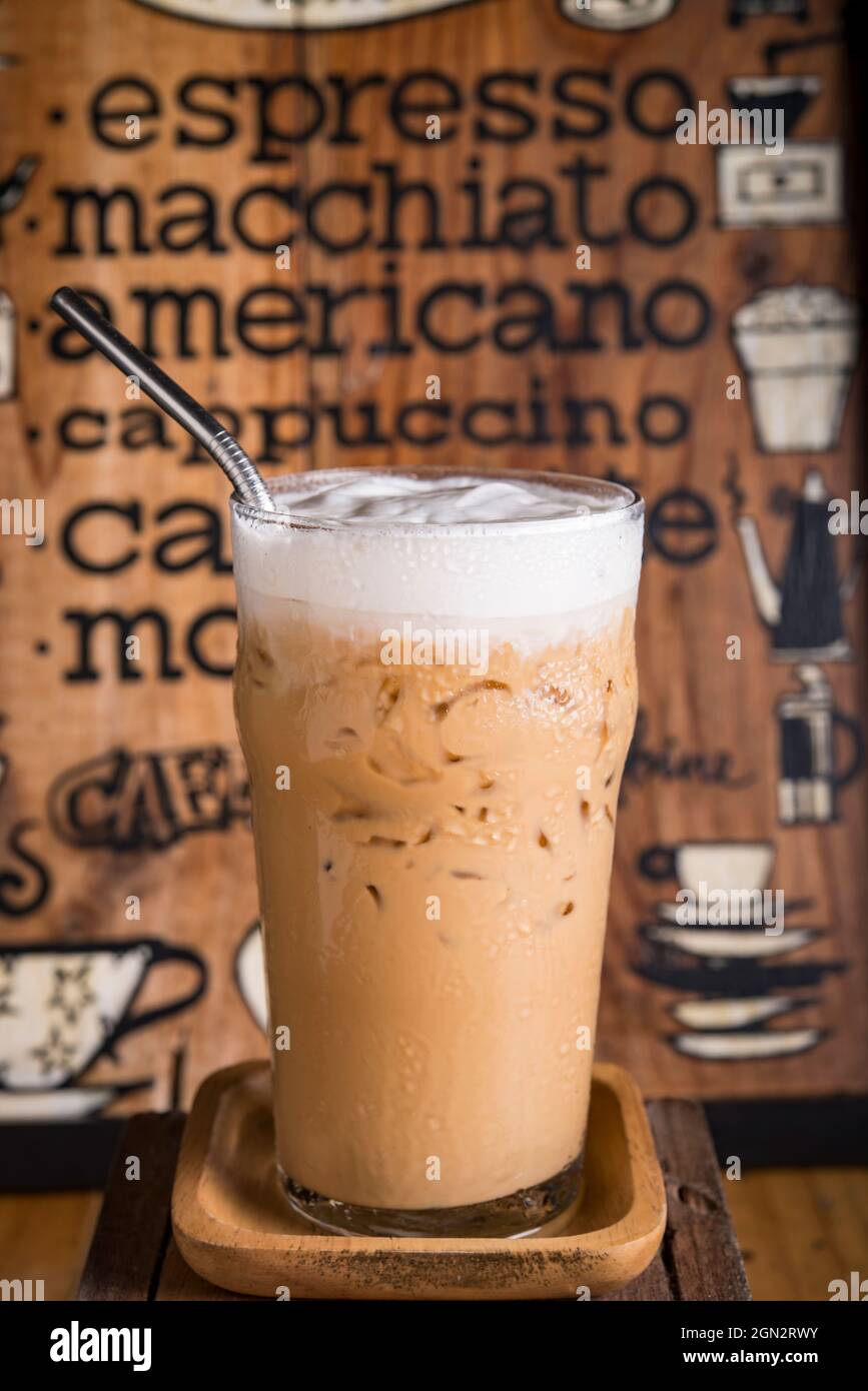 iced coffee drink with coffee menu board as background Stock Photo
