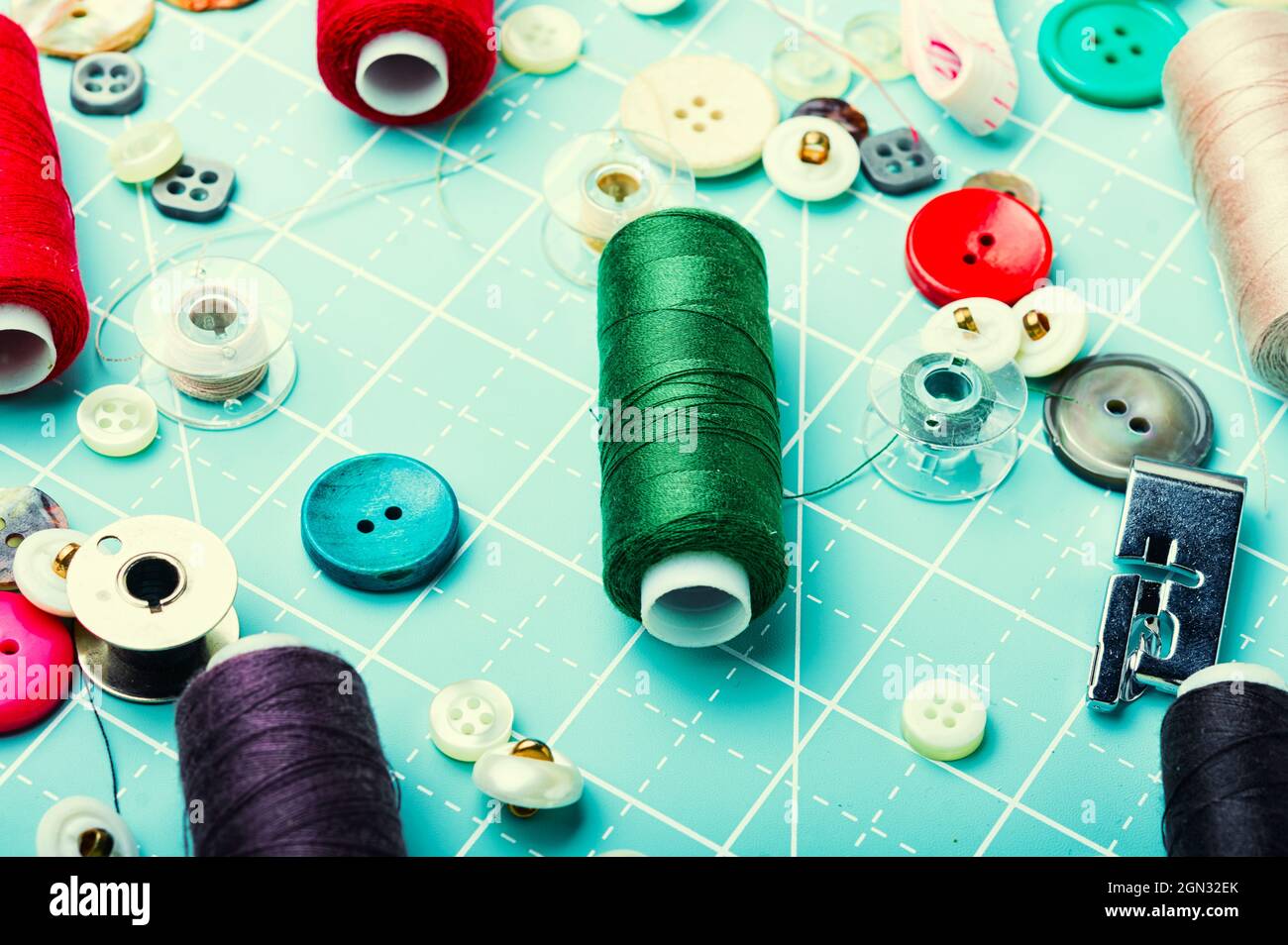 Sewing kit,thread,bobbin and buttons.Sewing background,accessories for ...