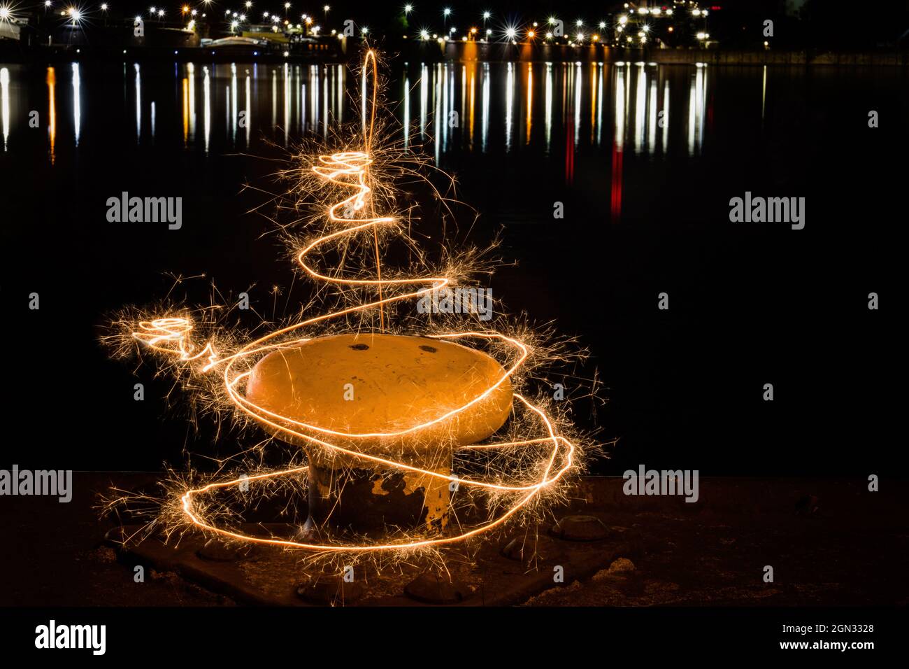 Light painting with sparklers at an industrial port Stock Photo