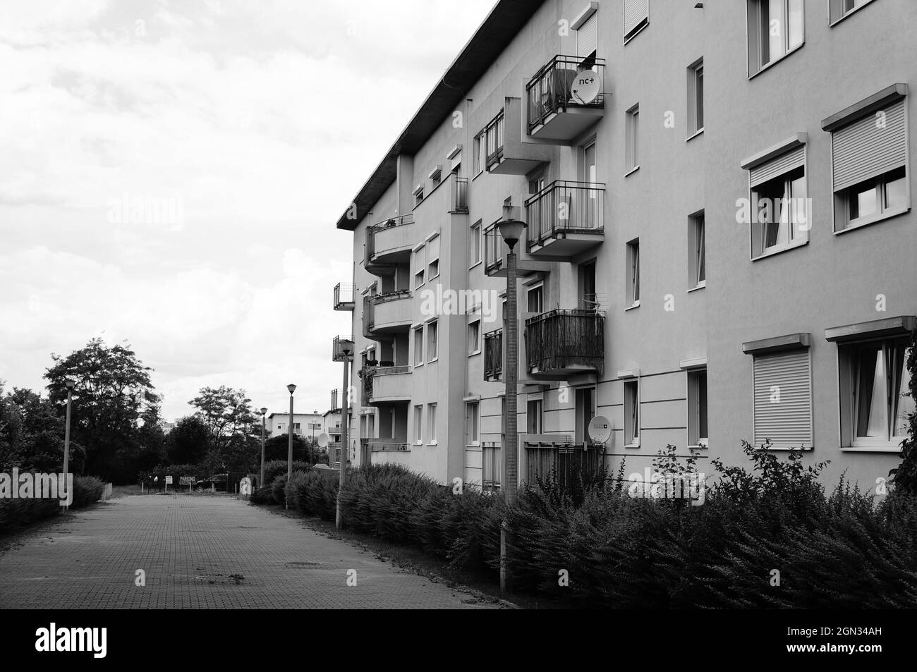 POZNAN, POLAND - Jun 10, 2017: A grayscale of a four storey apartment building in the  Stare Zegrze district Stock Photo