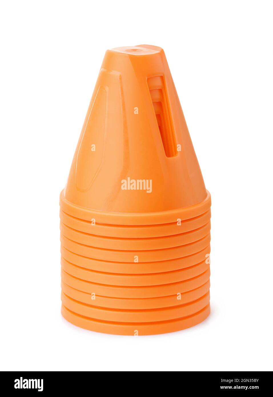 Stack of orange plastic safety traffic cone isolated on white Stock Photo