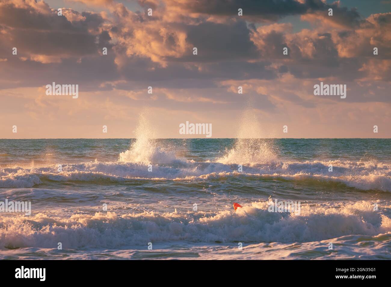 Golden sunset ocean waves hi-res stock photography and images - Alamy